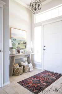 Modern Entryway Makeover | See how it went from a royal mess to huge success with just a few simple updates.