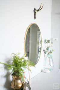 Have you ever finished hanging artwork and realized something just wasn't right? Learn how to hang artwork the right way and create a well styled home with these easy tips that will have you hanging art like a pro!