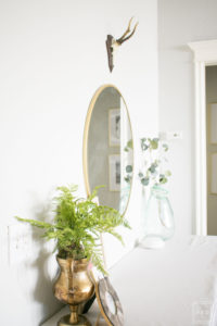 Have you ever finished hanging artwork and realized something just wasn't right? Learn how to hang artwork the right way and create a well styled home with these easy tips that will have you hanging art like a pro!