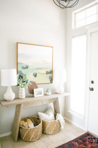 Have you ever finished hanging artwork and realized something just wasn't right? Learn how to hang artwork the right way and create a well styled home with these easy tips that will have you hanging art like a pro!