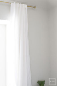 How To Hang Curtains The Right Way! This guide will instantly show you how you can make even the smallest room look bright and airy just by changing the way you hang curtains.