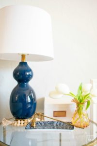 Welcome to our Spring Home Tour: See how we transformed our home with just a few simple changes, a brass glass end table, navu gord lamp,antique hobnail vase create the perfect vignette.