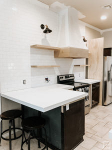 DIY white oak open shelving without breaking the bank. See how we added four white oak shelves to our kitchen for under $250