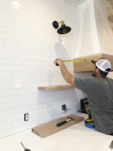 DIY white oak open shelving without breaking the bank. See how we added four white oak shelves to our kitchen for under $250