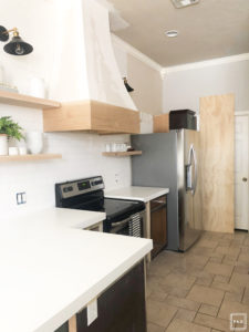 DIY white oak open shelving without breaking the bank. See how we added four white oak shelves to our kitchen for under $250