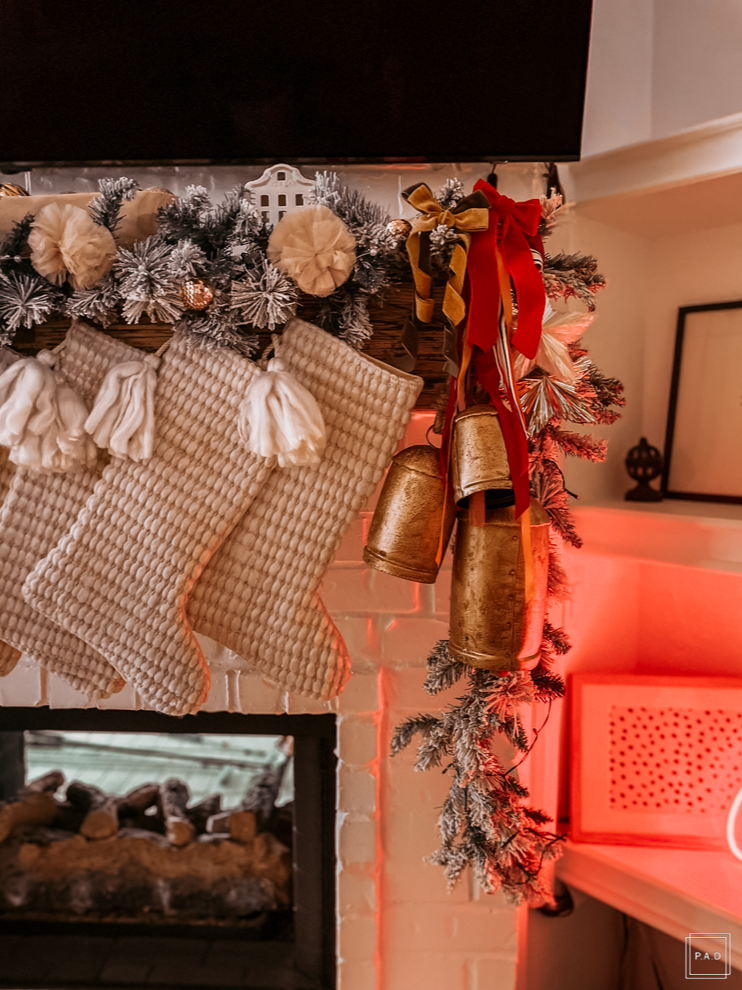 A Modern Christmas living room Decorated with a red neon Merry Christmas sign