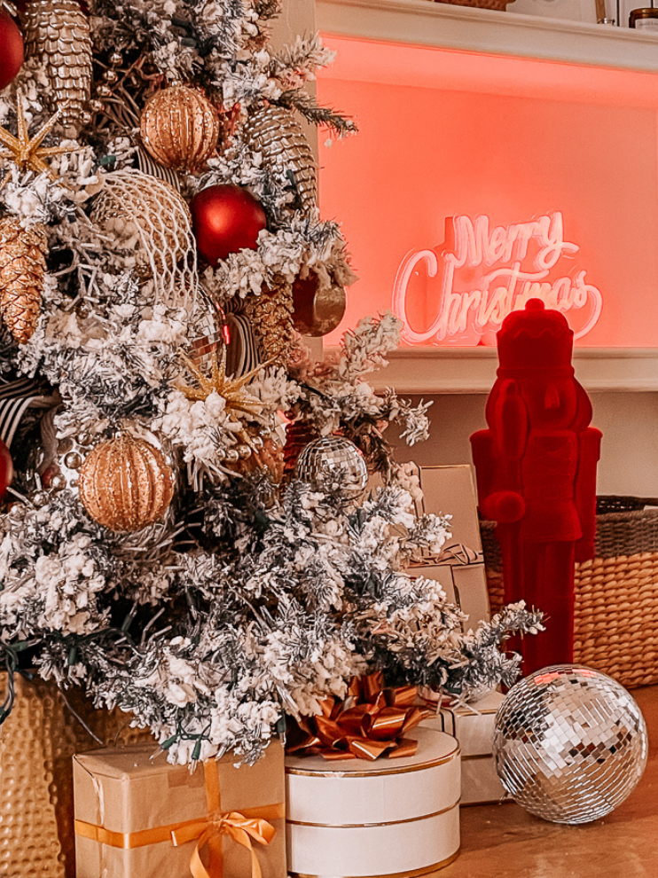 A Modern Christmas living room Decorated with a red neon Merry Christmas sign
